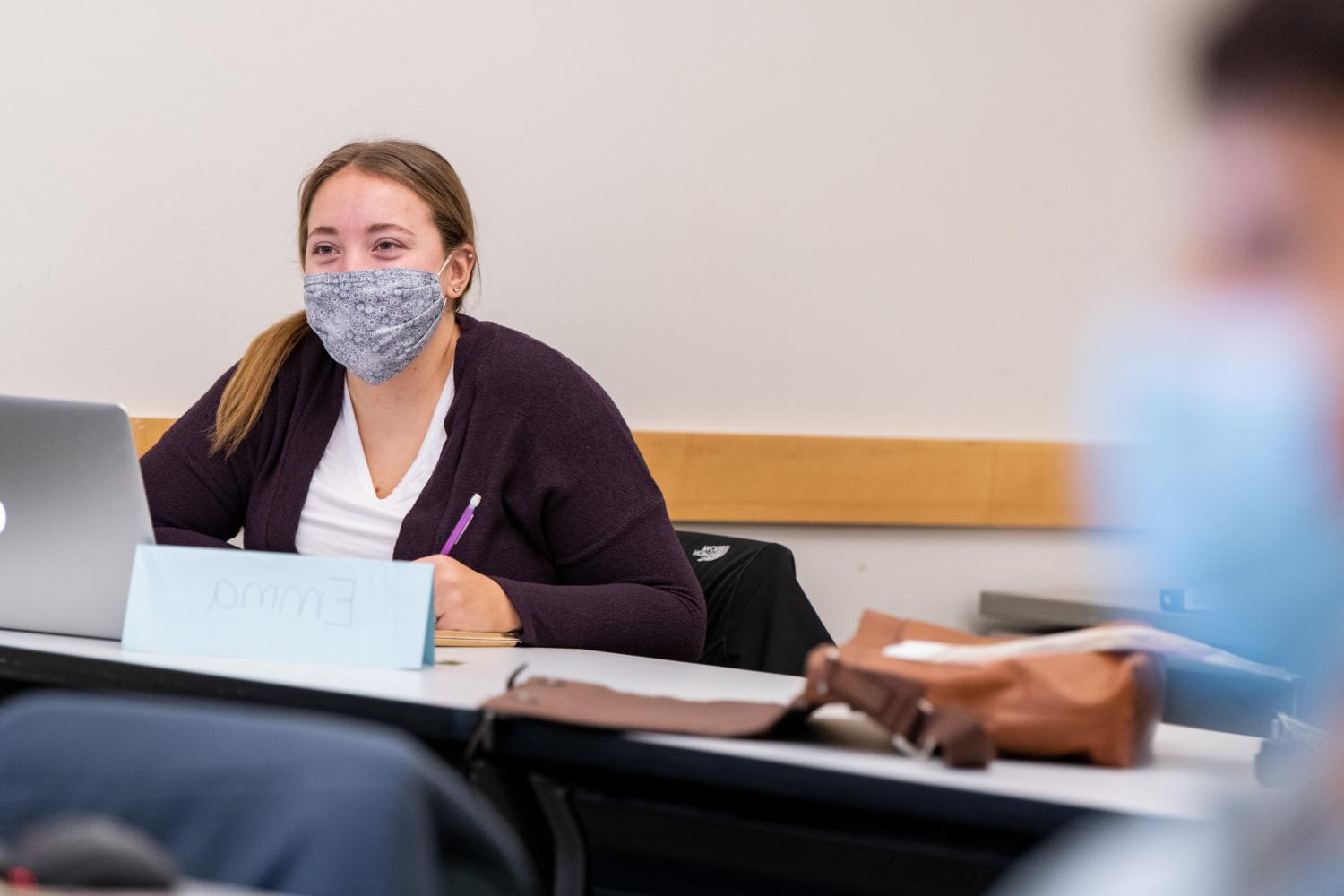 A graduate student in Carthage's Master of Science in Business -- Sports Management program listens to a visiting speaker.